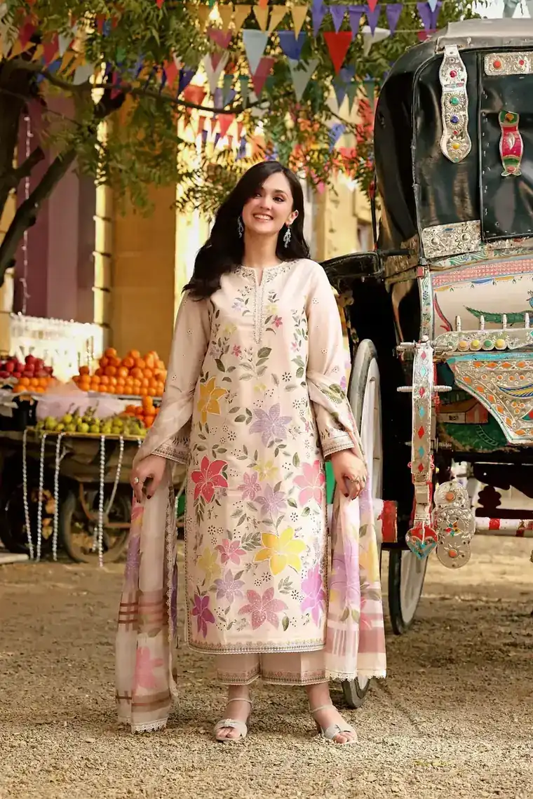 Woman wearing an embroidered linen suit — shop from Pakistan on Markaz